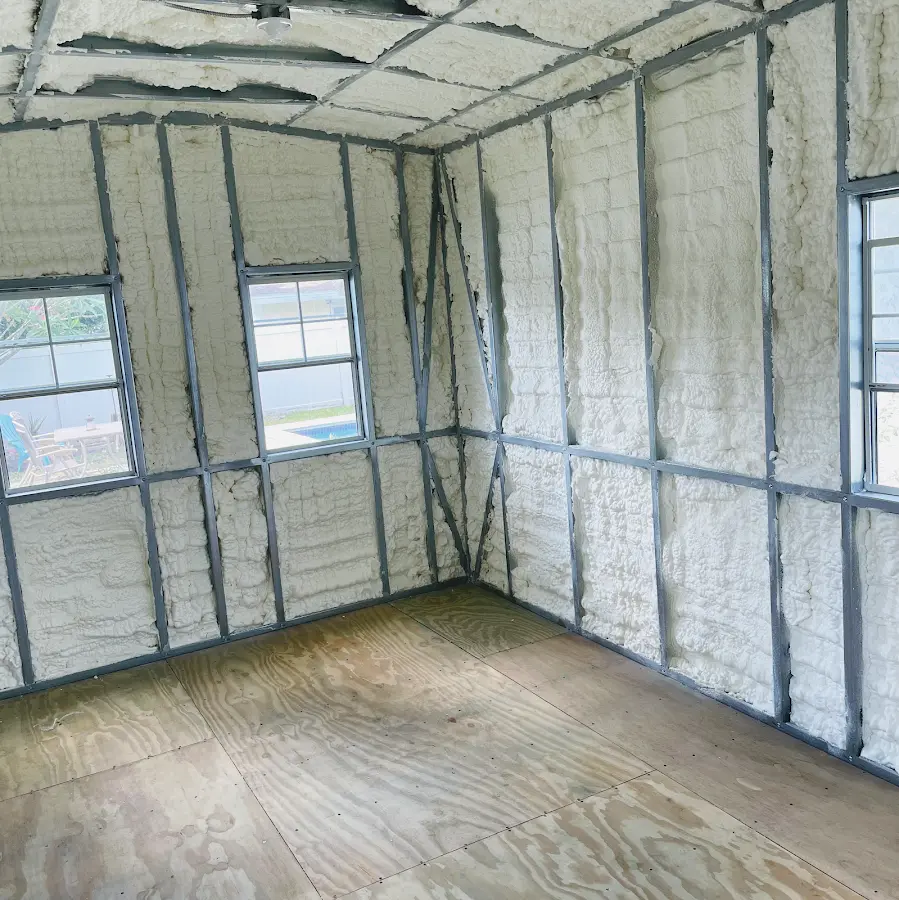 Closed-cell spray foam insulation applied to wall cavities in a residential project in Orange